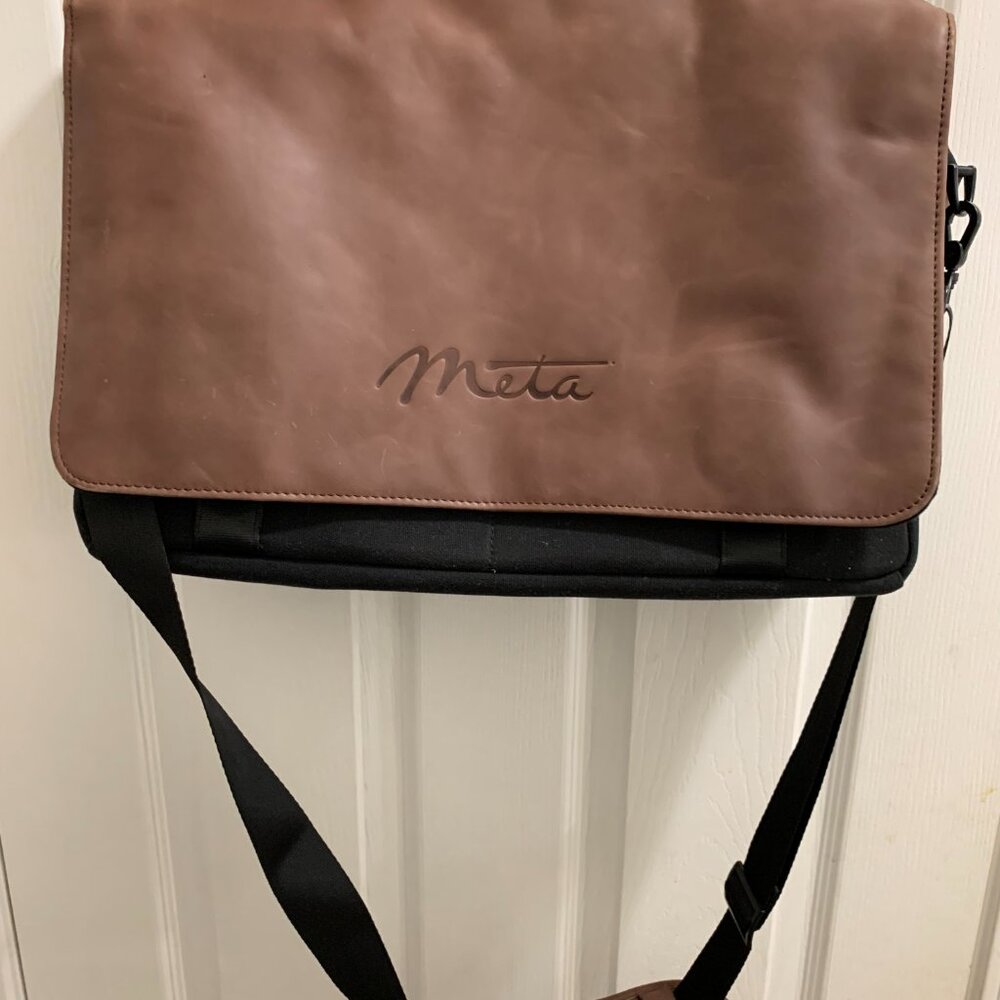 Meta Canvas and Leather Brown and Black Large Messenger Laptop Travel Bag.